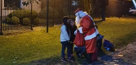 Papai Noel visita feiras livres e gastronômicas de Curitiba